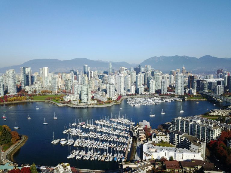 A breathtaking view of downtown Vancouver showcasing the city architecture and mountain views.